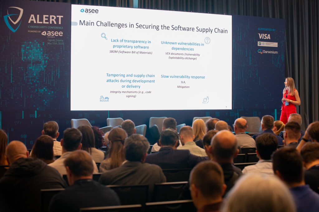 woman presenting at a cybersecurity tech conference anout software supply chain